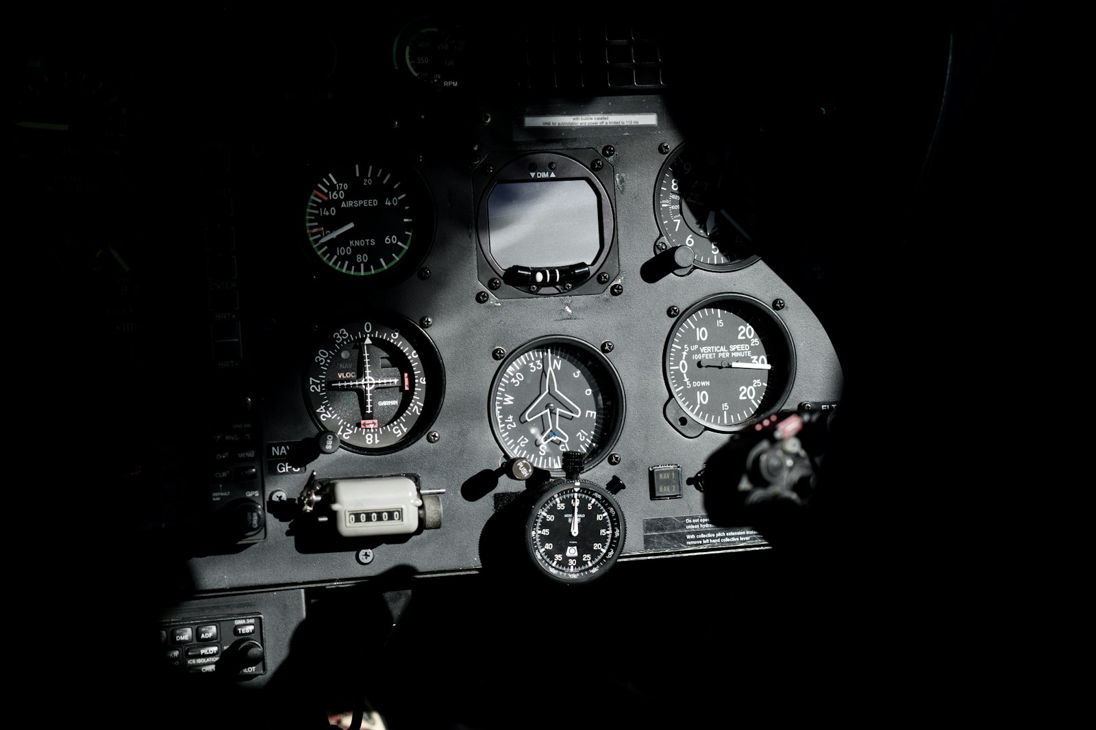 An airplane cockpit with complex instrumentation and controls — representing the layered safety systems that prevent catastrophic failures
