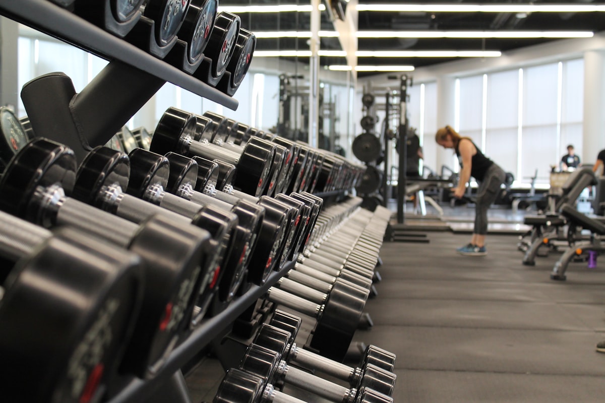 A gym interior with equipment — the perfect metaphor for Apple's new 12-month commitment subscription model on the App Store