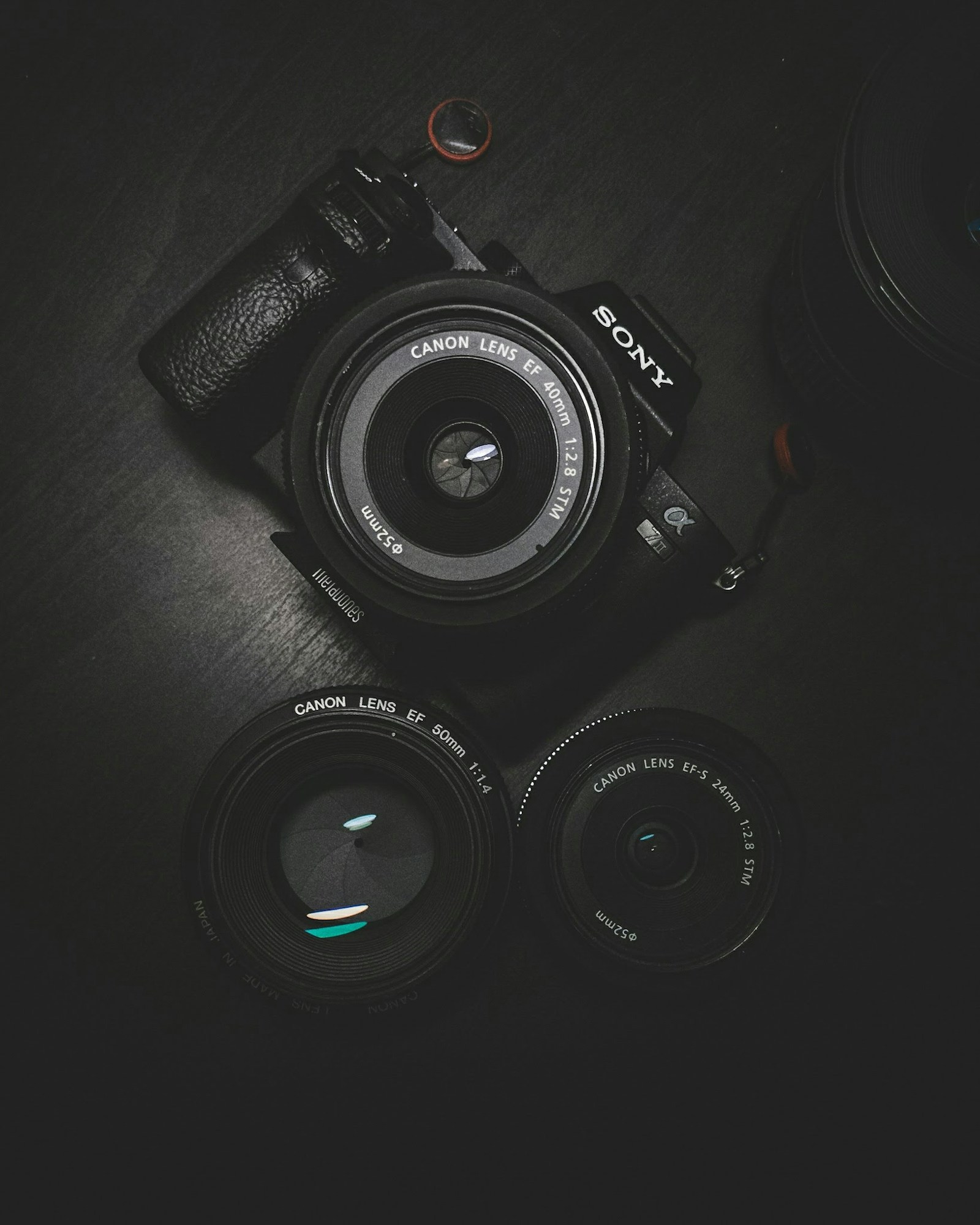 A close-up of a professional camera lens with warm light reflections — representing the new AI-powered Visual Intelligence pipeline Apple is bringing to iOS developers